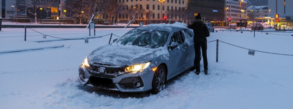 honda civic covered by snow