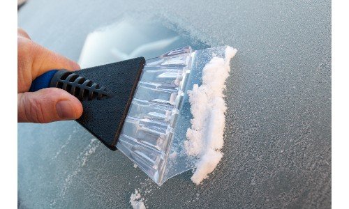 scrapping ice off windshield